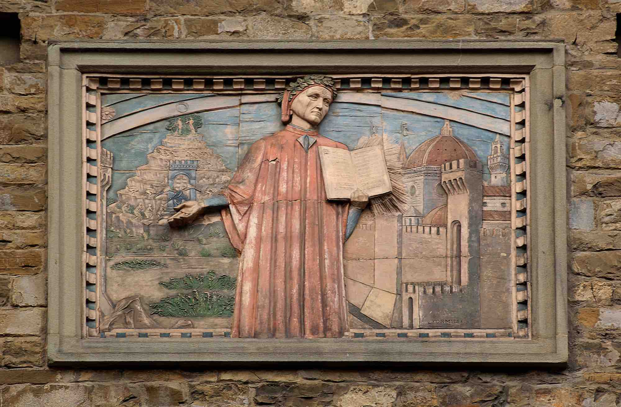 Bassorilievo rappresentante Dante e la Commedia, su un palazzo di Firenze