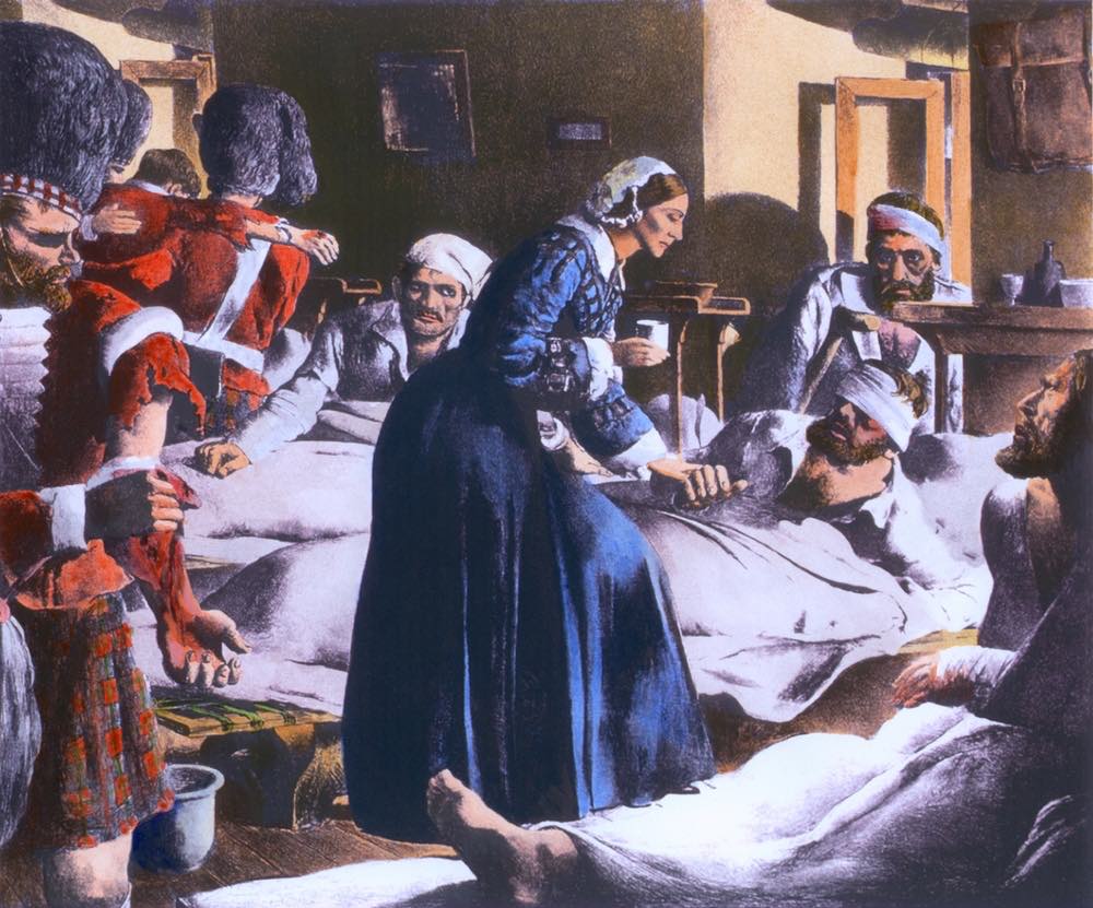 Florence Nighitngale in un dipinto che la ritrae in un ospedale 
